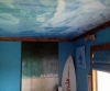 Underwater ceiling mural with personalized surfboard
