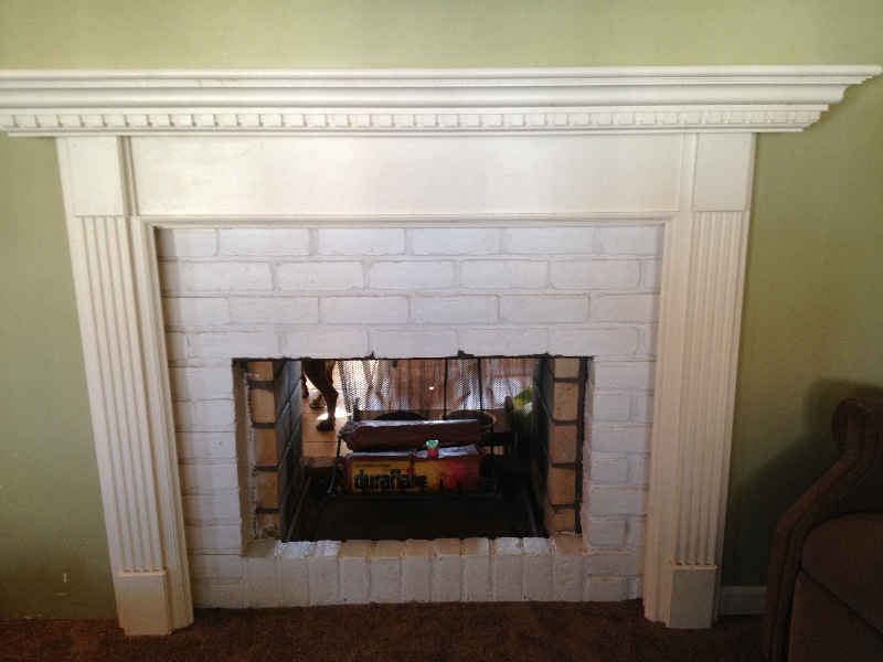 BEFORE -- painted bricks and mantle